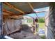 View of the interior of a horse stall, displaying a shaded area and an attached outdoor paddock at 4404 Musket Dr, Lakeland, FL 33810