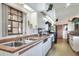 Features double sinks, stainless steel appliances, and bright lighting at 4404 Musket Dr, Lakeland, FL 33810