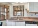 Double sink with wood countertops and bright, natural lighting at 4404 Musket Dr, Lakeland, FL 33810