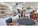 View of the kitchen and game area with modern appliances and custom bar at 4404 Musket Dr, Lakeland, FL 33810