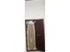 Handy, fold-away ironing board with storage and cabinet at 4404 Musket Dr, Lakeland, FL 33810