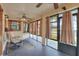 Bright sunroom showcasing natural light, neutral walls and a chair at 4404 Musket Dr, Lakeland, FL 33810