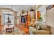 Open living room features hardwood floors, vaulted ceilings, and natural light at 506 Henley Cir, Davenport, FL 33896