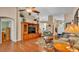 Inviting living room with hardwood floors, ample seating, and natural light at 506 Henley Cir, Davenport, FL 33896