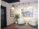 Inviting lobby area with comfortable seating, contemporary artwork, and elegant lighting at 530 E Central Blvd # 405, Orlando, FL 32801