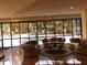 Bright lobby with large windows, comfortable seating, and views of lush landscaping at 530 E Central Blvd # 405, Orlando, FL 32801