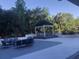 Charming outdoor gathering space with comfortable seating and a stylish gazebo at 530 E Central Blvd # 405, Orlando, FL 32801