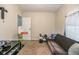 A bedroom with a basketball hoop and black futon at 5339 Meadow Grove Trl, Lakeland, FL 33810