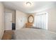 A bedroom featuring carpeted floors and a white dresser at 5339 Meadow Grove Trl, Lakeland, FL 33810