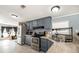 Functional kitchen with granite countertops, stainless steel appliances, and tile floors at 5339 Meadow Grove Trl, Lakeland, FL 33810