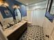 Bathroom with double sinks and designer tile at 5604 Stratford Ln, Lakeland, FL 33813