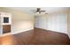 Spacious bedroom featuring hardwood floors, neutral paint and private bath access at 5604 Stratford Ln, Lakeland, FL 33813