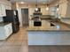 Kitchen with stainless steel appliances and granite countertops at 5604 Stratford Ln, Lakeland, FL 33813