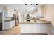 Modern kitchen equipped with stainless steel appliances, granite countertops, and ample cabinet space at 5604 Stratford Ln, Lakeland, FL 33813