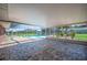 Screened in patio overlooking a pool and back yard at 5604 Stratford Ln, Lakeland, FL 33813