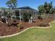 Pool with surrounding landscaped area at 5604 Stratford Ln, Lakeland, FL 33813