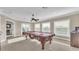 A bonus room featuring neutral walls, carpeted floor, and a pool table at 6546 Eagle View Loop, Lakeland, FL 33813