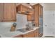 Close up shot of kitchen with stainless steel appliances, cooktop, and ample counter space at 6546 Eagle View Loop, Lakeland, FL 33813