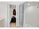 Bathroom featuring a shower and a view into a walk-in closet at 6750 Lemon Tree Dr, Lakeland, FL 33813