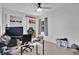 Bedroom features light wood flooring, closet space, and a ceiling fan with a light at 6750 Lemon Tree Dr, Lakeland, FL 33813