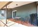 Covered patio area with a table and chairs, great for outdoor dining at 6750 Lemon Tree Dr, Lakeland, FL 33813