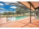 The inviting pool features a screened enclosure and provides a tranquil retreat at 6750 Lemon Tree Dr, Lakeland, FL 33813