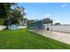 The property's backyard features a small shed and a well-kept lawn at 6810 Palomino Dr, Lakeland, FL 33811