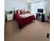 Comfortable bedroom with soft carpet, nice natural light, and television at 816 Elizabeth Ln, Lakeland, FL 33809