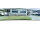 Charming single-story home featuring a well-maintained lawn and covered parking at 816 Elizabeth Ln, Lakeland, FL 33809