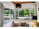 Sun room with lots of windows and seating at 921 Avon Ave, Lakeland, FL 33801