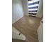 This bedroom features light wood floors and a window for natural light at 930 E Tee Cir, Bartow, FL 33830