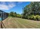 Expansive backyard with mature trees and lush greenery, perfect for outdoor entertaining at 1 Brogden Se Ct, Winter Haven, FL 33880