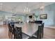 Open-concept living space that includes the kitchen, the dining room, and the living room, all tied together at 1 Brogden Se Ct, Winter Haven, FL 33880