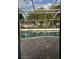 Relaxing screened-in pool with brick patio, perfect for a serene outdoor retreat at 1110 Cypress W Pt, Winter Haven, FL 33884