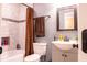 Updated bathroom features a tile shower and modern vanity at 1160 Eleanore Ave, Bartow, FL 33830