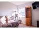 Cozy room with a large window and wood bookcase at 1160 Eleanore Ave, Bartow, FL 33830