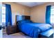 Bedroom featuring plush bedding and matching nightstands at 1160 Eleanore Ave, Bartow, FL 33830