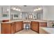 Spacious bathroom with dual sinks, ample counter space, and a soaking tub at 1215 Evergreen Park Cir, Lakeland, FL 33813