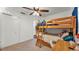 Bedroom with bunk beds, a study area, and ample space at 1215 Evergreen Park Cir, Lakeland, FL 33813