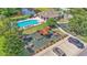 Community amenities include a playground, pool, clubhouse, picnic tables, and lush landscaping at 1215 Evergreen Park Cir, Lakeland, FL 33813