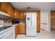 Kitchen with Oak cabinetry and modern, stainless steel appliances at 1317 Old Polk City Rd, Lakeland, FL 33809