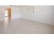 Spacious living room featuring tile floors and an open layout, great for entertaining and relaxation at 1317 Old Polk City Rd, Lakeland, FL 33809