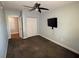 Bedroom features a ceiling fan, closet and outlets for wall mount tv at 1328 Edgewater Beach Dr, Lakeland, FL 33805