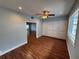 Bedroom with hardwood floors, fan and built-in cabinets at 1328 Edgewater Beach Dr, Lakeland, FL 33805