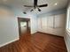 Dining room showcases hardwood floors, built-in cabinets, and backyard view at 1328 Edgewater Beach Dr, Lakeland, FL 33805