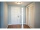 Inviting entryway featuring hardwood floors, a closet, and natural light at 1328 Edgewater Beach Dr, Lakeland, FL 33805