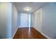 Entryway boasts wood floors, a closet, and a glass-block window next to the door at 1328 Edgewater Beach Dr, Lakeland, FL 33805