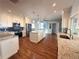 Gourmet kitchen with stainless steel appliances, island, and granite countertops at 1328 Edgewater Beach Dr, Lakeland, FL 33805