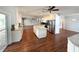 Large kitchen featuring granite countertops, stainless steel appliances, and hardwood flooring at 1328 Edgewater Beach Dr, Lakeland, FL 33805