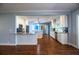 Bright, remodeled kitchen features white cabinets, granite counters, and stainless steel appliances at 1328 Edgewater Beach Dr, Lakeland, FL 33805